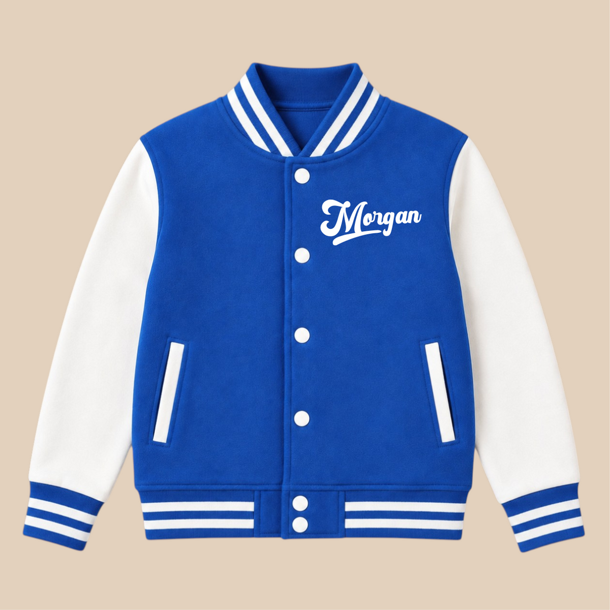 A royal blue and white varsity-style jacket with white buttons, striped ribbed collar, cuffs, and hem, and the name 'Morgan' embroidered in white script on the chest, shown on a plain beige background.