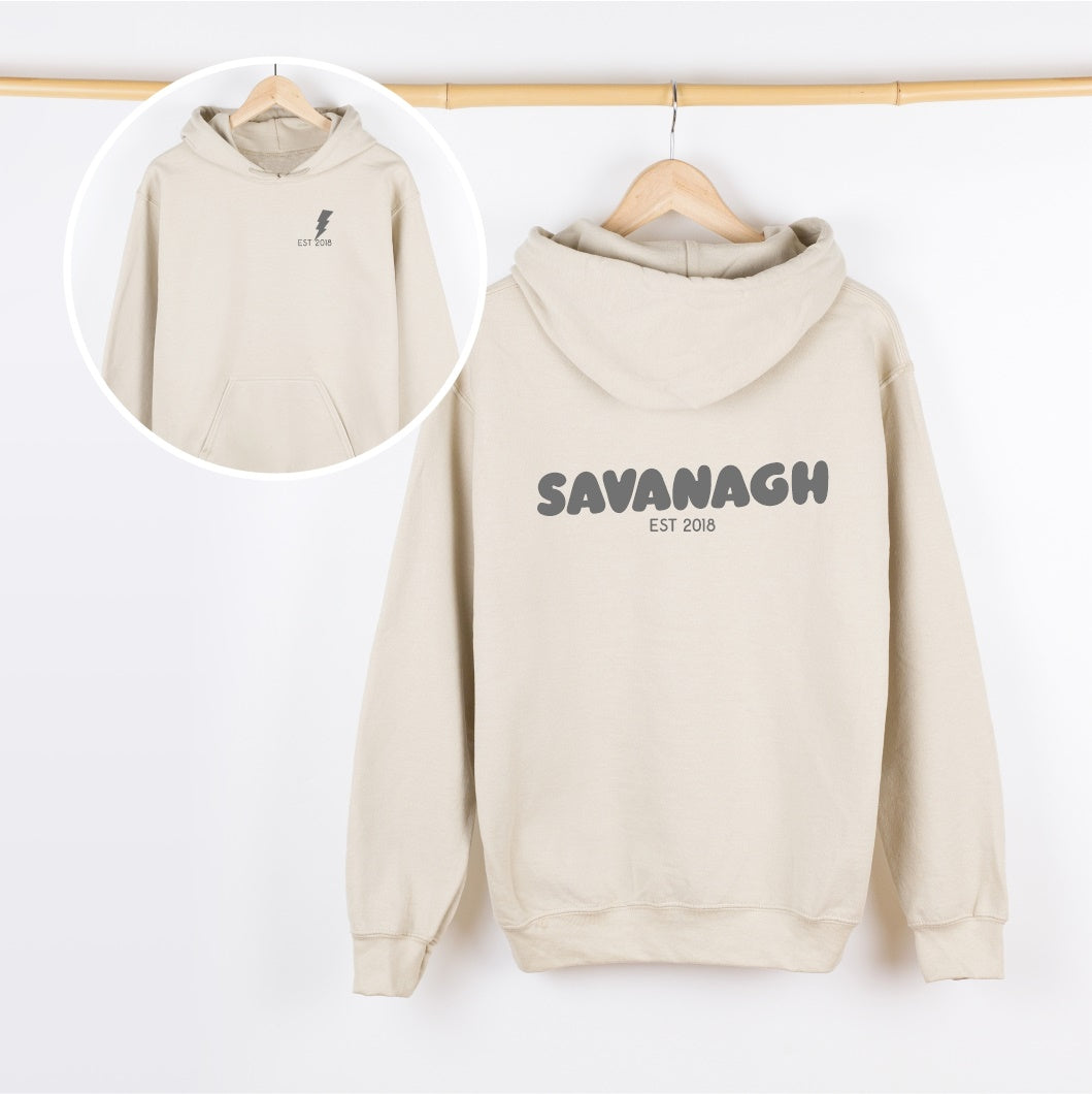 Beige hoodie with 'SAVANAGH EST 2018' text on a white background