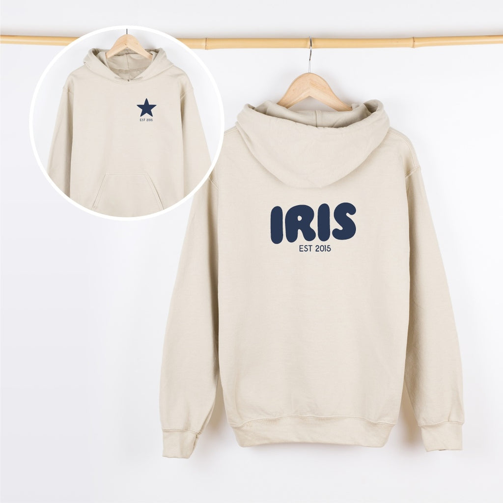 Beige hoodie with 'IRIS EST 2016' text on a white background