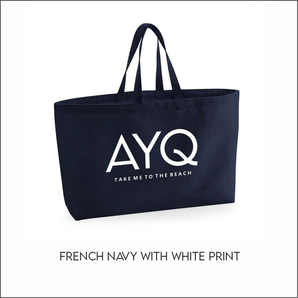 Navy tote bag with white text on a white background