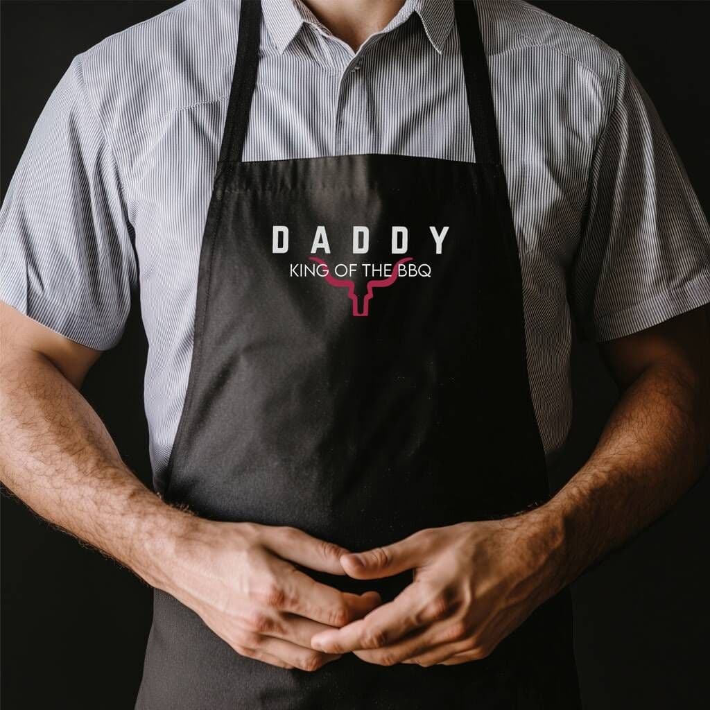 King Of The BBQ Personalised Apron â€” Ideal for summer barbecues, cooking in the kitchen, or manning the grill with pride â€” a must-have for dads who love to cook and enjoy being