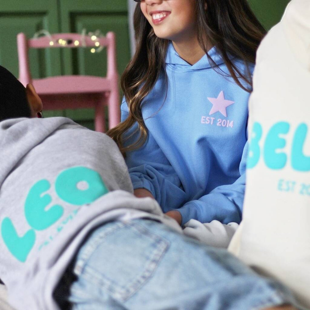 Personalised Puff Print Hoodie in Carolina Blue, Vanilla and Grey.
