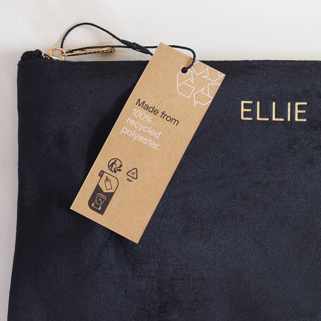 Black drawstring bag with 'ELLIE' branding and a recycled polyester tag on a white background