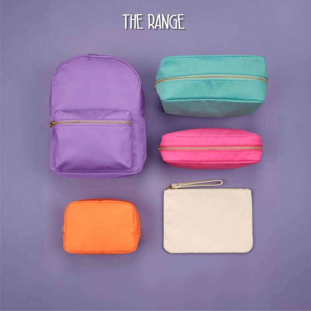 Five colorful bags on a purple background with 'The Range' branding.