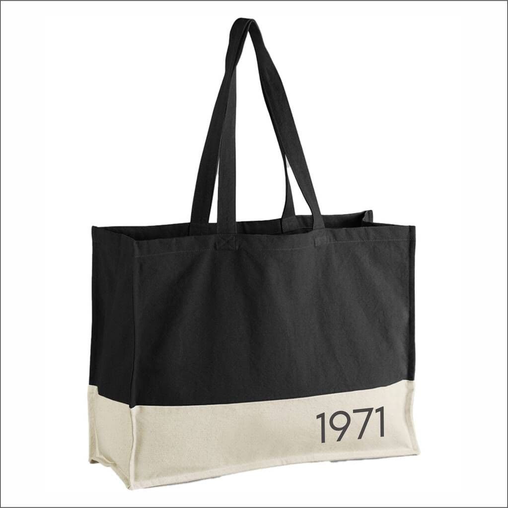 Black and beige tote bag with '1971' print on a white background